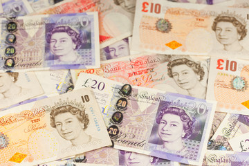 Fototapeta na wymiar Background of British banknotes