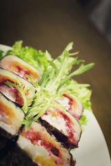 Portion of rolls served on the white plate