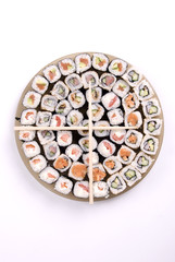 collection of different rolls served on the round plate