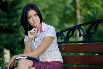 girl sudying in park