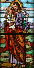 Saint Joseph holding baby Jesus