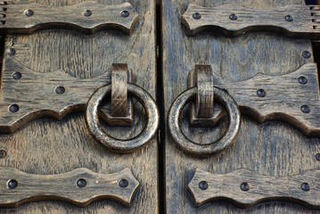 Decorative door with forged handles.