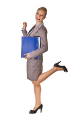 Caucasian blond businesswoman in suit holding ring binder on whi