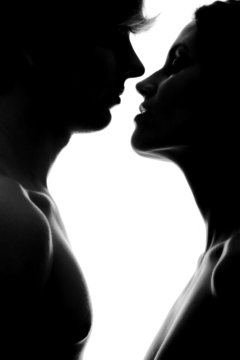 Sexy couple. Sensual kiss of man and woman in black and white.