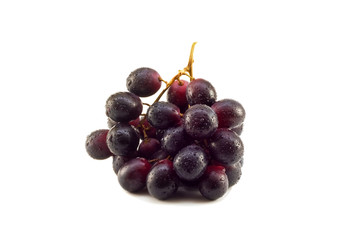 Cluster of grapes with water drops isolated on a white backgroun