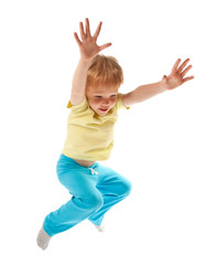 Happy jumping boy isolated on white