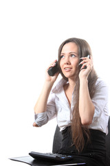 Fototapeta premium Surprised businesswoman speak by two phones
