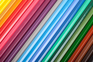 Colored pencils background (shallow focus)
