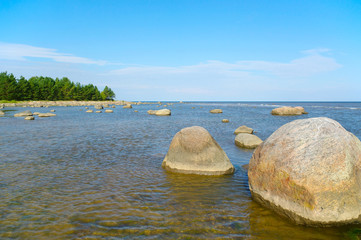 Fototapeta na wymiar Big stones in water.
