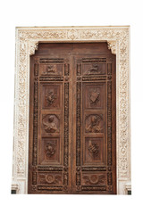 Main wooden door at Santa Croce church, Florence.