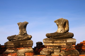 headless Buddha ruins at the temple in Ayutthaya