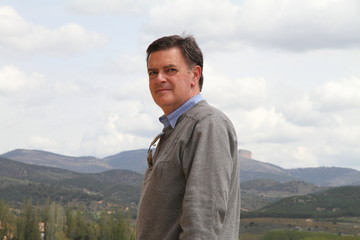 Man in the mountains looking at camera Spain