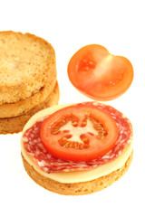 Crispbread with Cheese Tomato and Saucisson Sec