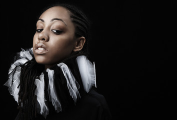 afro-american beauty in a black-white theatrical jabot