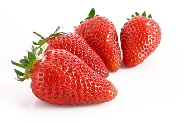 Few strawberries isolated on white