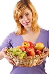 woman with fruit basket (white background-focus on fruits)