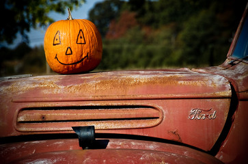pumpkin on old ford pick up truck