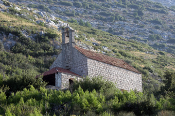 Fototapeta na wymiar A little church above the sea coast