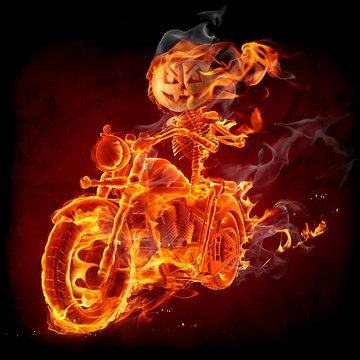 Burning pumpkin riding a motorcycle