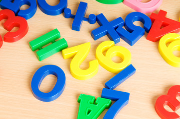 Fototapeta premium Children letters and digits on the table