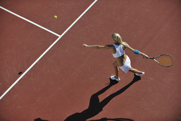 young woman play tennis