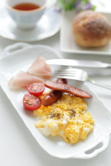 Scrambled egg and sausage breakfast
