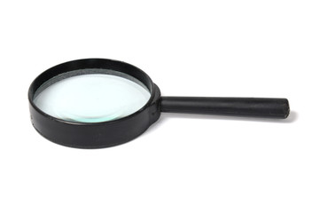 Magnifying glass over white