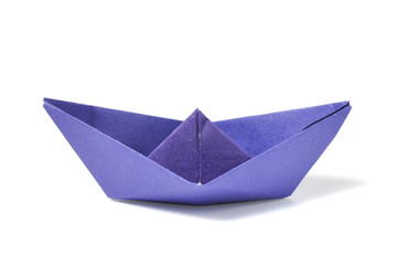 Close up origami ship over white