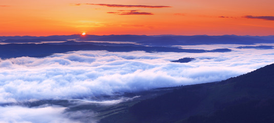 sunset is in mountains