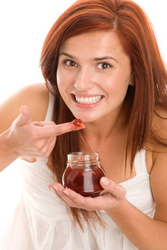 Young Woman Eating Jam