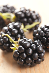 blackberries on wooden table