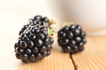 blackberries on wooden background