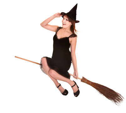 Young woman witch fly on  broom. Isolated.