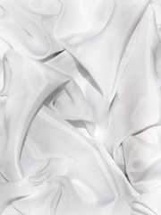 Fototapeta na wymiar texture of a white silk