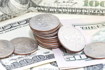 coins on dollars background
