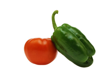 Ripe red tomato and green sweet pepper on a white background