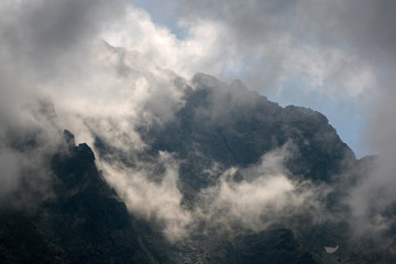 Clouds dancing in front of rock walls in the Tatra Mountains