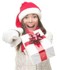 Christmas woman giving gift excited