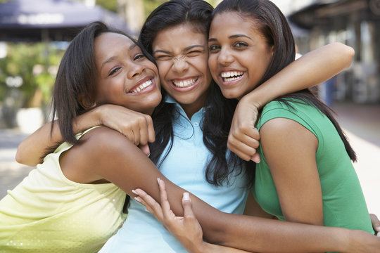 Teenage Friends Hugging