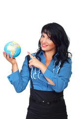 Business woman pointing to globe