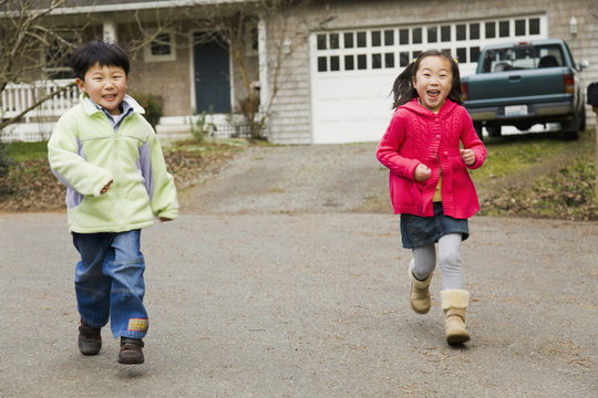 Korean Children Running In Street