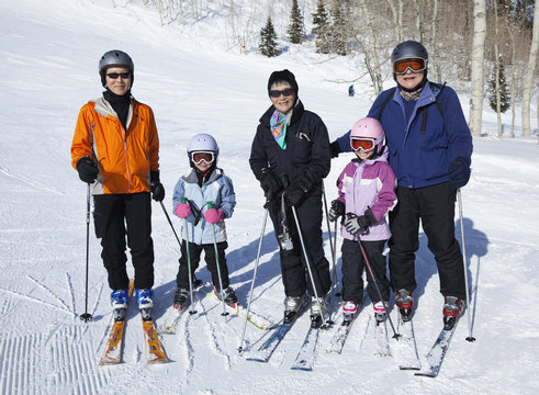 Family preparing to go skiing