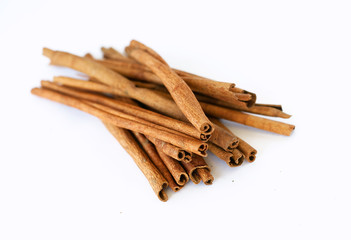 cinnamon sticks on whtie