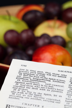 Holy Bible open to Galatians 5:22 - Fruit of the Spirit
