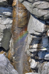rock canyon with rainbow