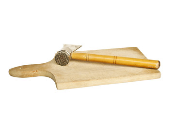 Wooden meat hammer on kitchen board isolated on white