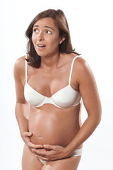Obraz premium Pregnant woman cramps anxious pain contraction