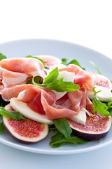 italian dry cured ham with figs, mozzarella und rocket