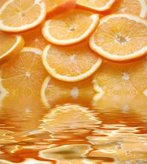 Tuinposter Plakjes fruit Oranje