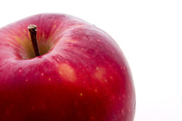 Natural tasty red apple isolated on white.